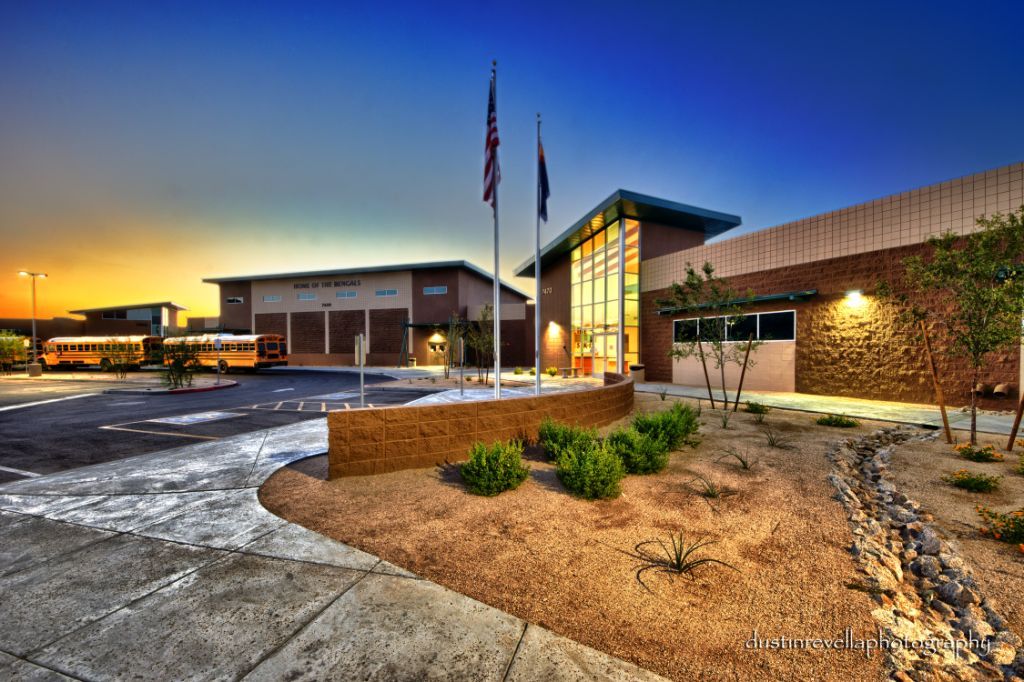 Skyline South Phoenix school facility in Arizona built by Highmark School Development; exterior with landscaping at dusk.