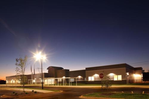Wide view of Riverwalk Academy at dusk