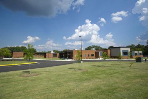 Wide shot of the school and school grounds