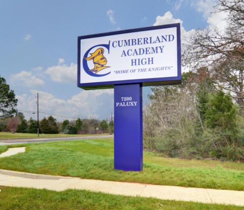 Large sign for Cumberland High School that reads "Home of the Knights"
