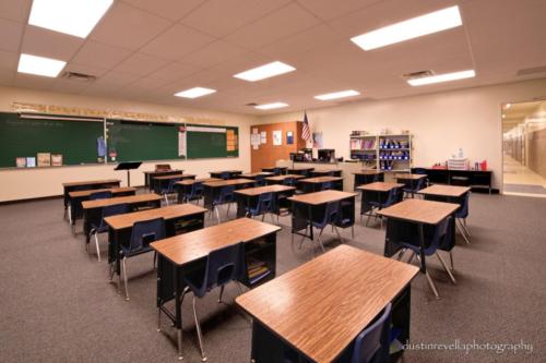 desks arranged in rows inside classroom