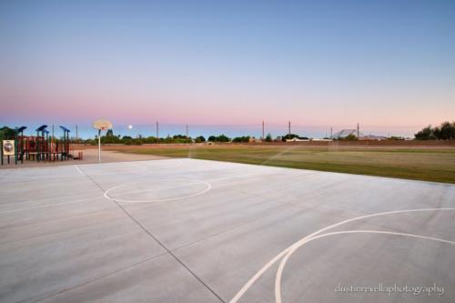 outdoor basketball court at sunset