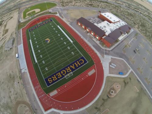 aerial view of school campus and football field