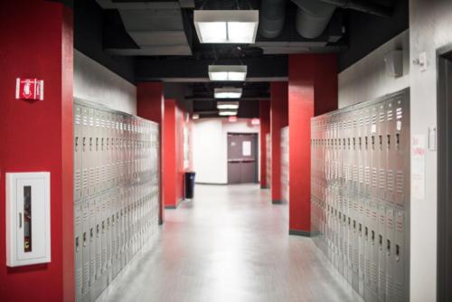 hallway with lockers on either side