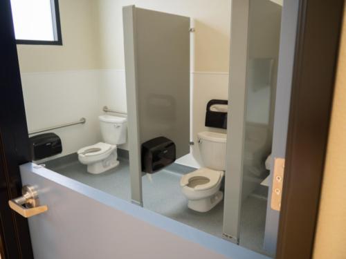 two stalls inside a restroom