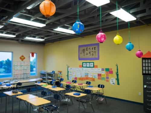 Classroom with paper lanterns hanging from ceiling