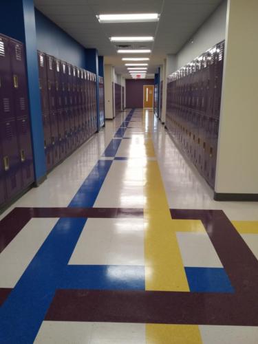 A hallway lined with lockers on both sides