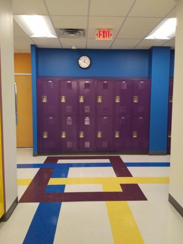 A small bank of purple lockers