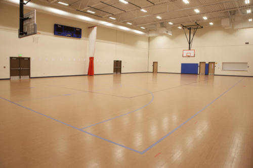 School gym with a full basketball court