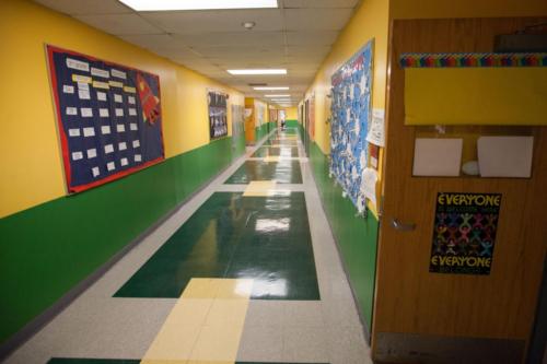 Hallway with art projects hanging on the walls