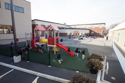 A school courtyard with playground equipment