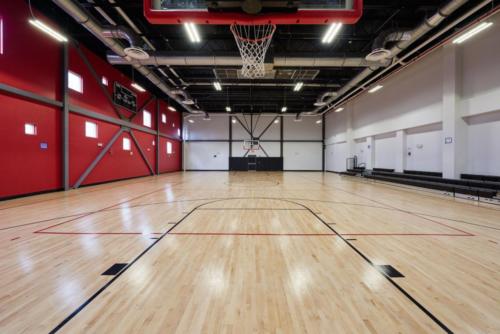 School gym with a full indoor basketball court