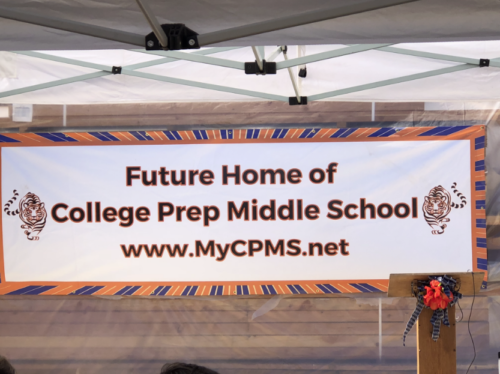 banner outside of charter school groundbreaking ceremony