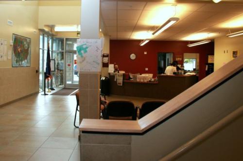 Looking at the school office and lobby area from a stairway