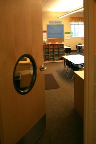 Looking into a classroom from just outside the doorway