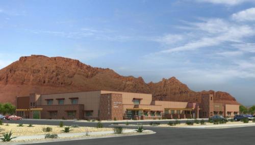 A rendering of Vista Charter School with a red rock structure in the background