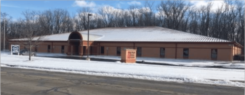 iLead Spring Meadows charter school with snow on the roof and ground